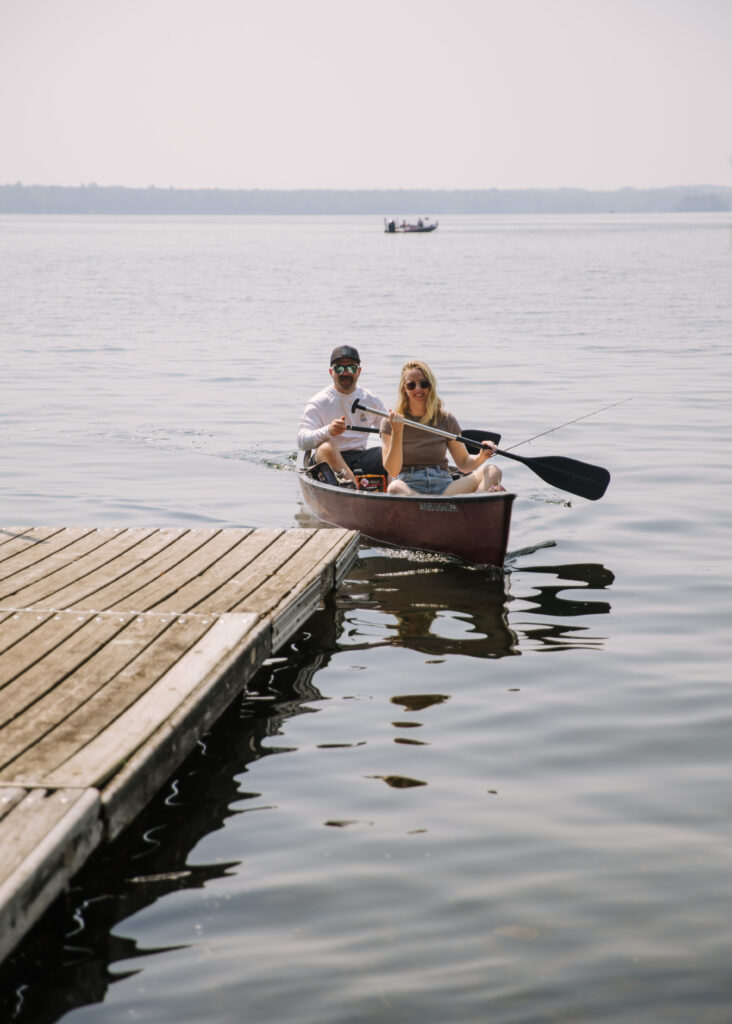 Stout's island Lodge a couple takes a canoe out on the morning of John and Cayla's wedding.