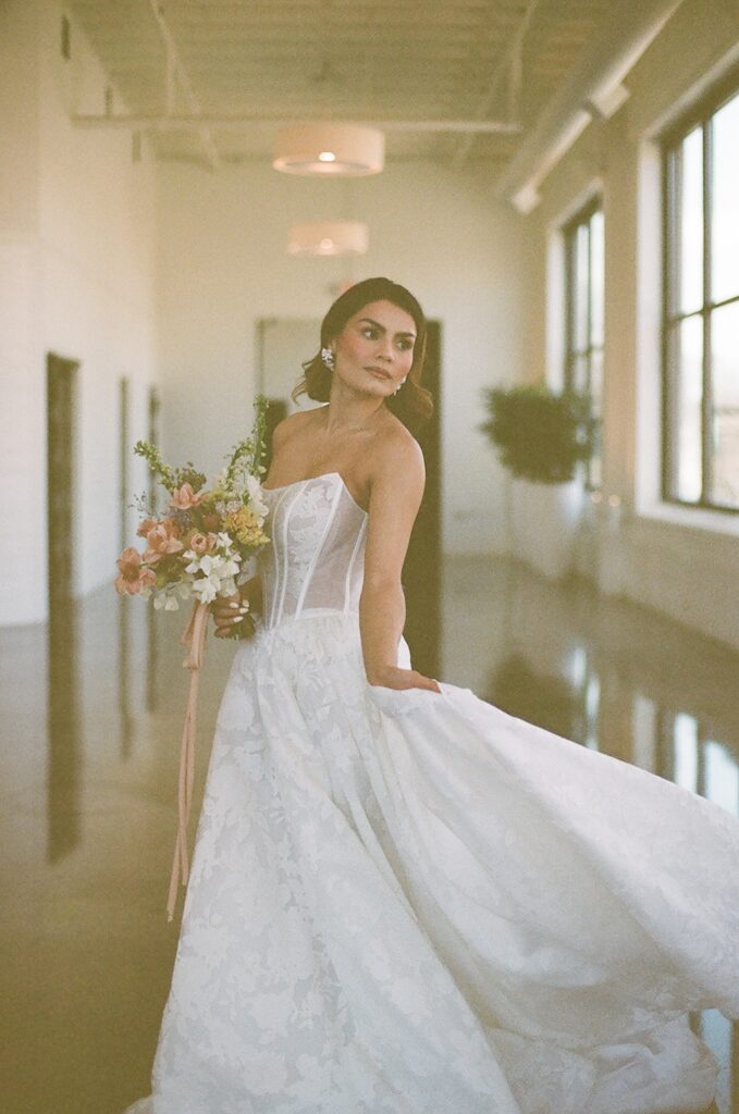 Minneapolis film photographer -bride in dress at the Urban daisy in Minneapolis, Minnesota