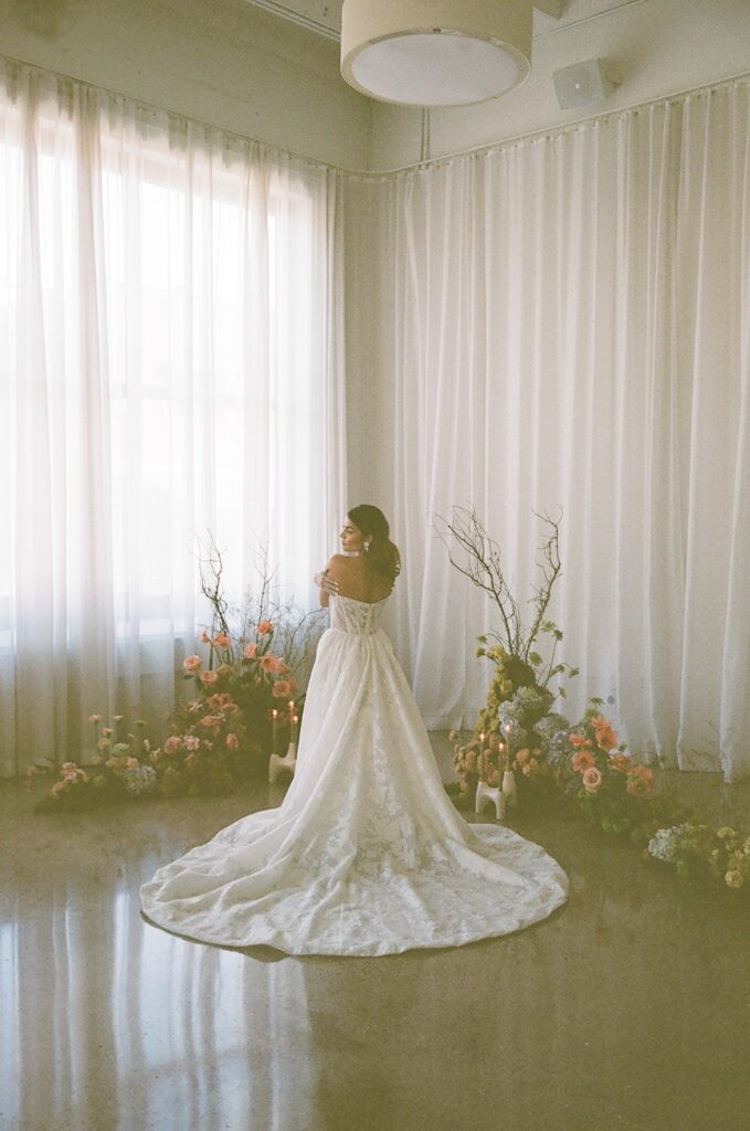 Minneapolis film photographer -bride in dress at the Urban daisy in Minneapolis, Minnesota